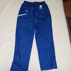 Brand: Adidas Style: Team Sports Woven Pants Color: Collegiate Royal Blue/ White Size: Small Has Zippers On The Legs, Drawstring At The Waist And Two Front Hand Pockets And One Pocket On The Right Leg. Nwt. No Box. Pet And Smoke Free Home Bin#234 Blue Adidas Activewear For Jogging, Adidas Sportswear Pants With Moisture-wicking, Adidas Moisture-wicking Sportswear Pants, Adidas Blue Sweatpants For Jogging, Adidas Blue Sweatpants For Sports, Adidas Sports Pants Full Length, Adidas Full Length Sports Pants, Adidas Sports Trousers, Adidas Blue Jogging Bottoms