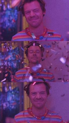 the man is smiling while standing in front of confetti falling from his head