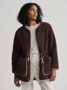 Designed with a relaxed fit, the Angelina coat features contrast trim detailing that adds a modern touch. Its curved hem and large patch pockets enhance both functionality and style, while an adjustable drawcord waist allows you to personalise the silhouette. Parka Coat Women, French Roast, Sherpa Coat, Elegant Coats, Contrast Piping, Parka Coat, Half Zip Pullover, Faux Fur Coat, Contrast Trim