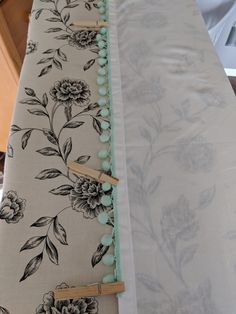 an image of a table setting with flowers and beads on the table cloth, ready to be used as a centerpiece