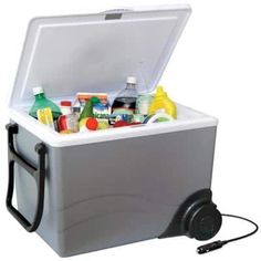 an ice chest with wheels is full of drinks and condiments on the top