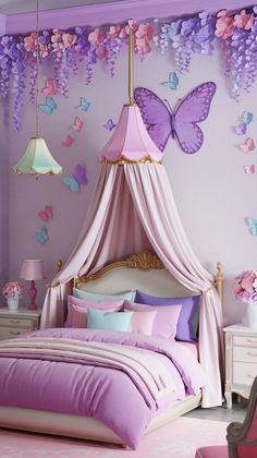 a bedroom decorated in pink and purple with butterflies on the wall