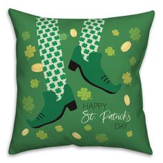 a st patrick's day pillow with green boots and shamrocks