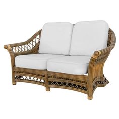 a wicker couch with two white cushions on it's armrests and back rest