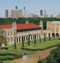 an aerial view of the university campus with tall buildings in the background