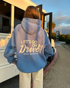 Presenting the "Let's Go on a Drive" hoodie. Late-night drives, gas station snacks, road trips, sunsets, good music, and meaningful conversations - my favorite memories happen behind the wheel. Features on the hoodie are embroidered with tackle twill suede fabric for maximum comfort. See product photos for up-close details. Dandy's Oversized Lux Hoodie line features a new fit entirely. A seamless shoulder means the hoodie falls over your arms like a warm hug. The wristband and waistband are upgr Cute Aesthetic Hoodies, Cute Graphic Hoodies, Cute Hoodies Aesthetic, Dandy Hoodie, Good Hoodies, Gas Station Snacks, Dandy Worldwide, Nike Winter Jackets, Trendy Sweatshirts