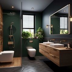 a bathroom with green walls and wooden floors