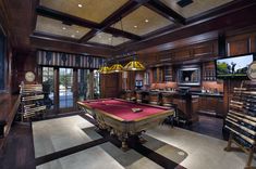 a pool table in the middle of a room