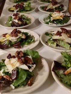 many plates with salads on them and the words, my 100 year old home the best dinner party recipes