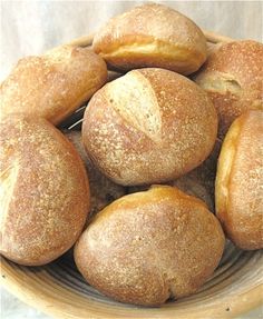 a basket filled with loaves of bread