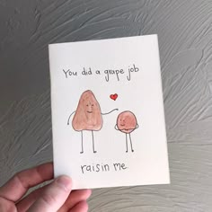 someone is holding up a card that says, you did a grape job raisin me