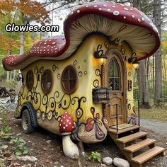 a mushroom like house with steps leading up to it