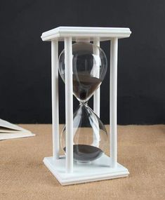 PRICES MAY VARY. Title: Hourglass Timer for 60 Minutes Sandglass Timer for Kitchen Living Room Home Office Desk Bedroom Party Festival Coffee Table Book Shelf School Game Sand Timer Clock (White Frame Black Sand). Product Type: Categories > Kitchen & Dining > Kitchen Utensils & Gadgets > Thermometers & Timers > Timers Office Desk Bedroom, Hourglass Sand Timer, Hourglass Timer, Desk Bedroom, Sand Timer, Closet Office, Timer Clock, Sand Timers, Living Room Home Office