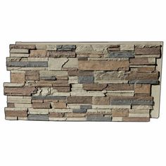 a stone wall that is made out of various types of stones and has different colors