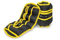 two black and yellow protective pads on a white background