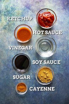 the ingredients to make ketchup are shown in small bowls on a blue surface