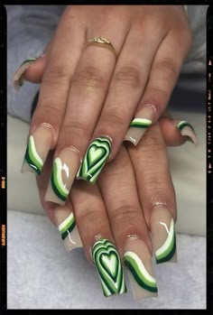 Acrylic Nails Green Heart Acrylic Nails, Matcha Green Acrylic Nails, Green Heart Nail Designs, Nail Art On Green Nails, Green Hearts Nails, St Pattys Day Nails Acrylic, Green And Nude Acrylic Nails, Acrylic Nails Ideas Green, Nails Green Heart