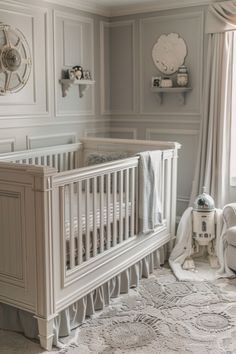 a baby's room with a crib in the corner