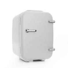 a white toaster sitting on top of a table