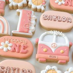 decorated cookies are arranged on a table