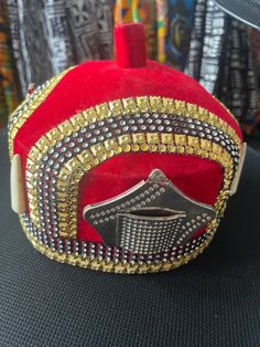 New Cowries Royalty Hat/African Prince/Traditional Hat/Chieftaincy Hat/Men Hat/Wedding Hat/cap/Igbo Hat/cowries  red background  Size; 23 Traditional Gold Costume Hats For Party, Adjustable Hat With Structured Crown For Festivals, Adjustable Structured Crown Hat For Festival, Adjustable Festival Hat With Structured Crown, Red Curved Brim Costume Hat For Festivals, Red Costume Hat With Curved Brim For Festival, Traditional Adjustable Headpieces For Parties, Ceremonial Headpiece With Tall Crown, Adjustable Tall Crown Headpiece For Ceremonial Occasions