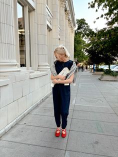 Red ballet flats - navy blue jumpsuit - striped sweater - ballet shoes - ballet flats outfit inspo - paris outfits - traveling outfits - navy blue and red outfits - classy outfit inspo - feminine outfits - ballet shoe trend - travel ootd - city fashion - red shoes - statement shoes Flat Shoes Outfit, Red Shoes Flats, Navy Blue Jumpsuit