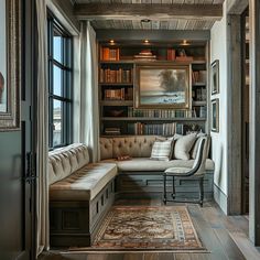 a living room filled with furniture and bookshelves next to a window on top of a hard wood floor