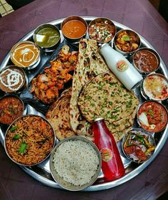 a platter filled with lots of different types of food