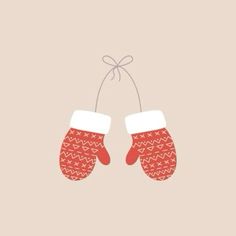 two red mittens hanging from a string on a beige background with a white bow