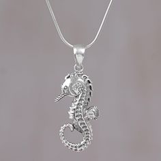 A handsome seahorse a symbol of patience and contentment seems buoyant as it dangles from a smooth snake chain. Artisan Made Sudiari from Bali hand-crafts this fabulous sterling silver pendant necklace which is detailed with expert precision and care. Seahorse Necklace, Sterling Silver Dangle Earrings, Gorgeous Bracelet, Silver Earrings Dangle, Silver Pendant Necklace, Snake Chain, Unique Earrings