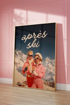 two women are standing in front of a pink wall with the words apres ski on it