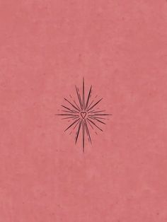 a pink background with a black starburst in the middle