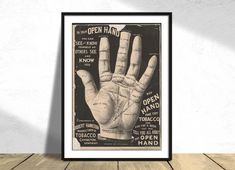 an open hand poster hanging on the wall