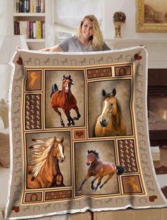 a woman holding up a blanket with horses on it