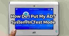 someone is holding up a tablet with the text how do i put my adt system in test mode