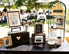 a table topped with pictures and other items