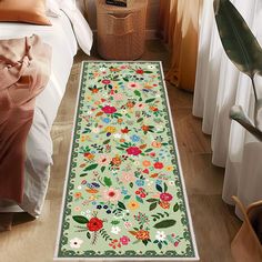 the floor mat is decorated with flowers and leaves