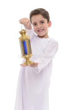 a little boy holding a golden trophy in his hands royalty images and clippings