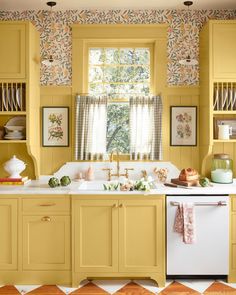 a kitchen with yellow cabinets and white counter tops is featured in the magazine's march 2013 issue