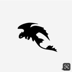 a black and white silhouette of a dragon flying through the air with its tail extended