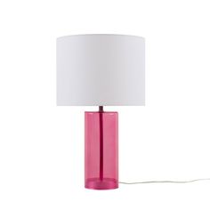 a pink glass table lamp with a white shade on the base and a light bulb plugged in