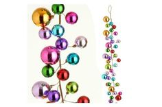 christmas ornaments hanging from a tree next to an ornament on a white background