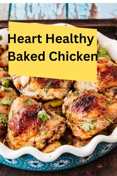 hearty baked chicken in a blue dish with a yellow sign