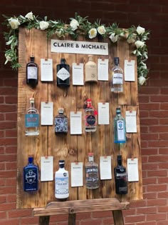 a wooden sign that has some bottles on it