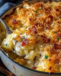 a close up of a casserole dish with broccoli and cheese