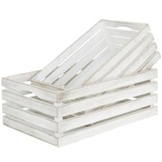 three white wooden crates stacked on top of each other