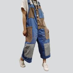 Introducing the 2023 Autumn Collection's pieced-together women's denim overall. a triumphant blend of the best of the Y2K era and today's trend-setting fashion!Why You'll Love It: Y2K-Inspired: Take a trip down memory lane with this statement-making piece. designed to pay homage to the millennium's legendary fashion sense. Patchwork Perfection: Its vibrant patchwork pattern speaks of a carefree. modern style that's both eye-catching and timeless. Baggy and Bold: Its loose silhouette and oversize Casual Denim Overalls With Patchwork, Casual Cotton Patchwork Overalls, Casual Baggy Patchwork Overalls, Casual Denim Patchwork Overalls Jumpsuit, Casual Blue Denim Jumpsuit With Patchwork, Denim Blue Patchwork Cotton Overalls, Blue Patchwork Denim Overalls Jumpsuit, Blue Cotton Patchwork Jumpsuits And Rompers, Blue Patchwork Overalls Jumpsuit