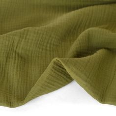 the fabric is green and has very thin lines on it's edges, as well as