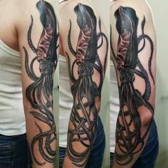 an octopus tattoo on the arm and shoulder