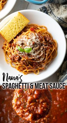 spaghetti and meat sauce with bread on the side